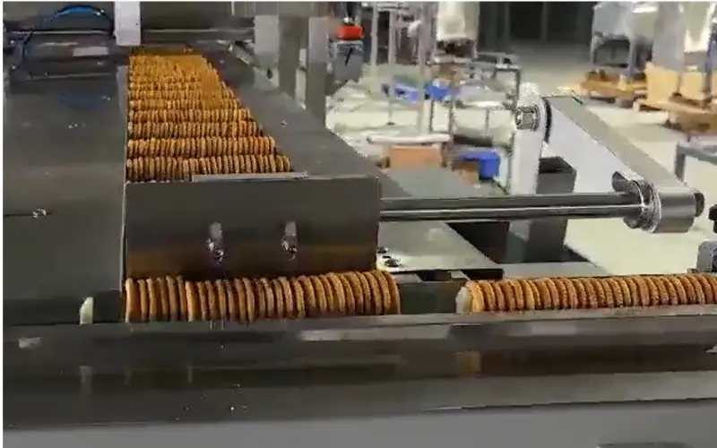 Engineering Excellence in Bakery Automation: FAT to 2-Lane Biscuit Sandwich On-Edge Packaging Line Engineering Excellence in Bakery Automation: FAT to 2-Lane Biscuit Sandwich On-Edge Packaging Line